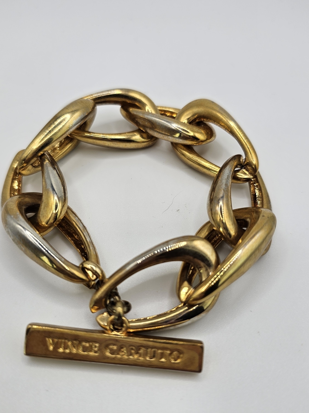 Vince Camuto Polished Gold Link Bracelet with Logo Bar